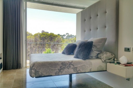 One of three bedrooms with views of the surrounding